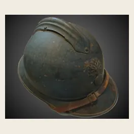 Casque Adrian modèle 1915 avec son cimier, son attribut frontal et sa jugulaire en cuir