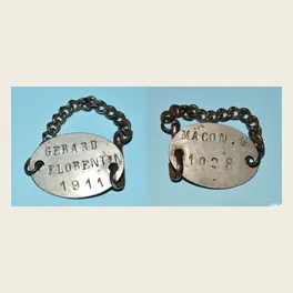 Les deux faces de la plaque d'identité ovale de Florentin Gérard, classe 1911, recrutement de Mâcon, matricule 1028, montée sur un bracelet de chaîne